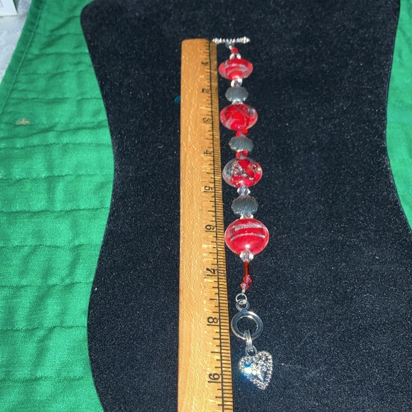 HAND CRAFTED MURANO red w/silver glass and st round beads w/toggle closing.  $30 - Picture 2 of 6